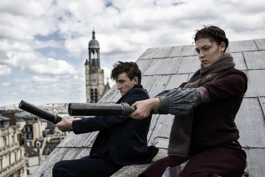 Two people on a roof