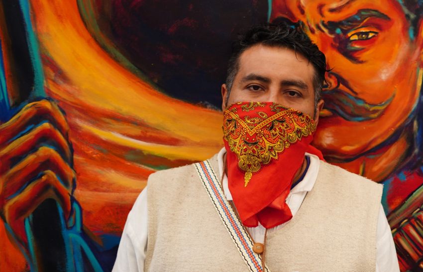 Person with scarf on face
