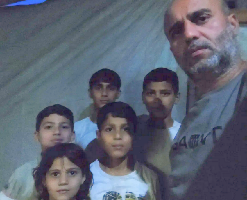 a displaced family in a tent in Gaza city