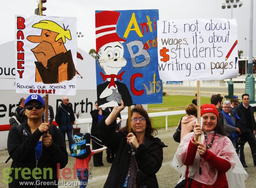 Signs at the rally against education cuts