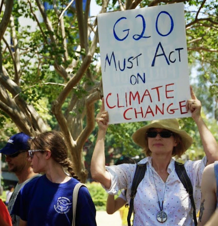 G20 must act placard at protests Brisbane 2014.