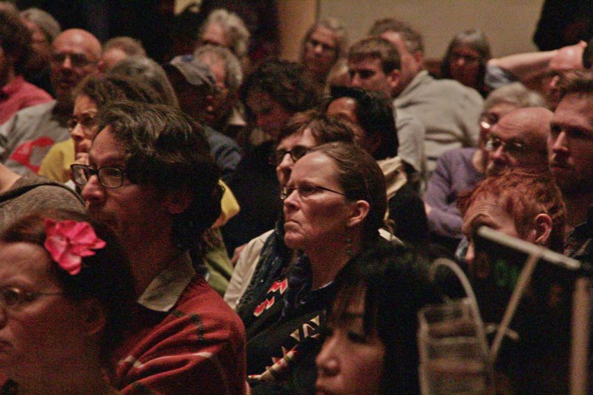 Audience listening to Icelandic MP Birgitta Jonsdottir speak.