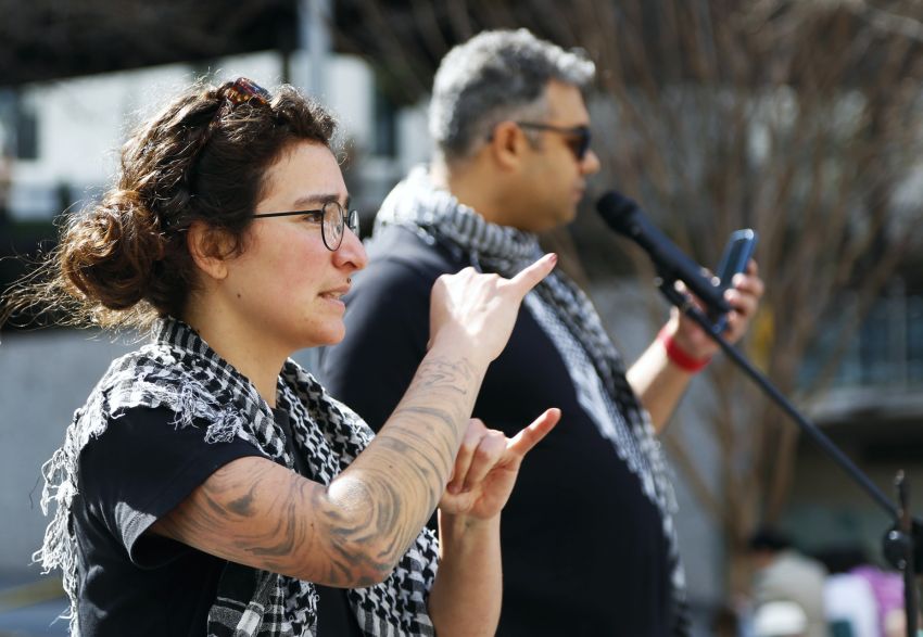 Omar Ashour speaking with an Auslan interpretter, Magan-djin/Brisbane, August 11