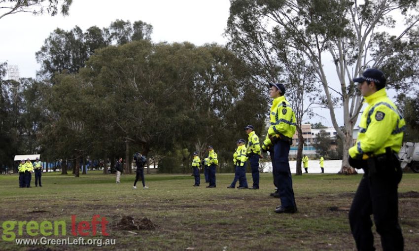 The entire operation was guarded by dozens of police.