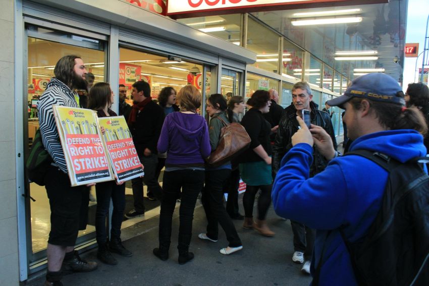 Participants in the Resistance conference picket a Coles store in Adelaide in solidarity with the workers on strike in Melbourne