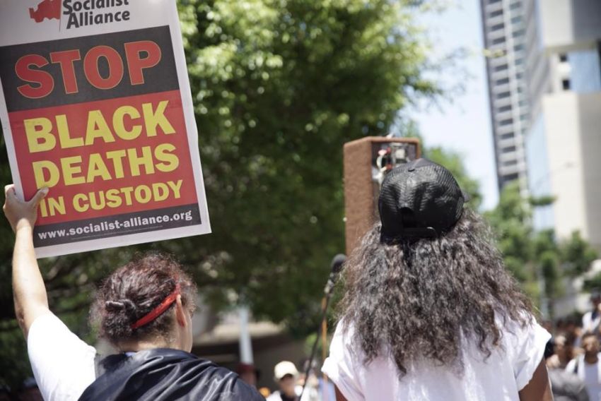 Protesters marched to Musgrave Park in West End.
