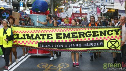Climate Emergency banner leads the march