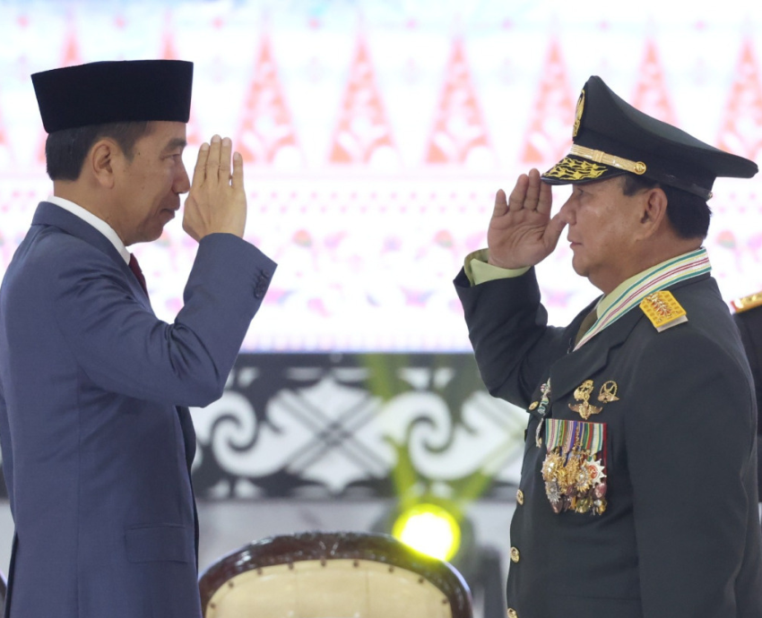 Two men saluting each other