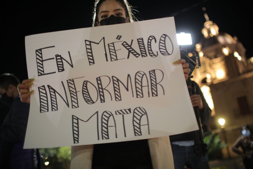 'In Mexico, informing kills', reads the placard of a protester in Michoacan. Photo: Ivan Villanueva