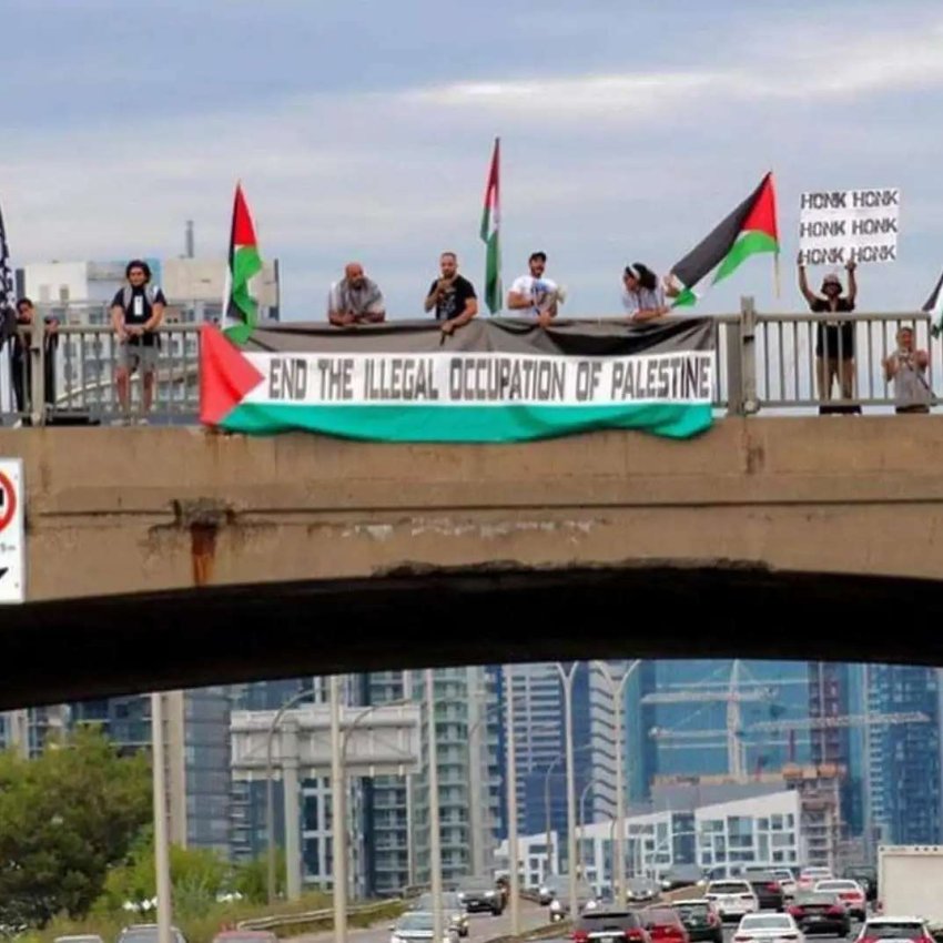 Palestine banner drop Toronto Canada
