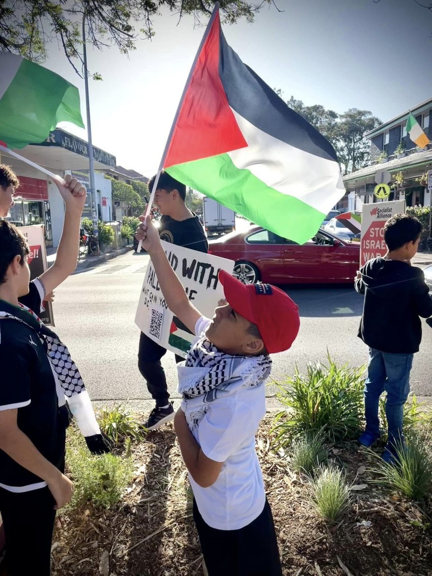 Child with Palestinian flag