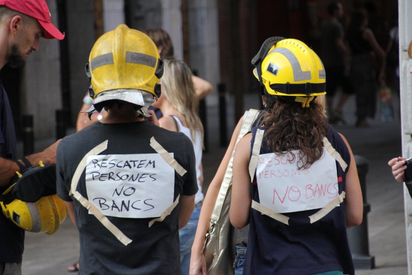 Firefighters take part in a 400,000-strong protest in Barcelona against austerity, July 19.