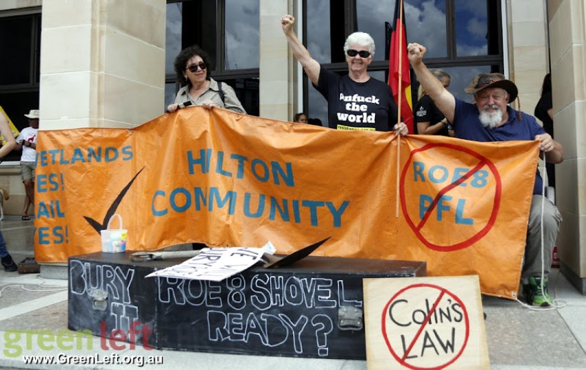 Protesters with banner and mock coffin to 'Bury ROE'