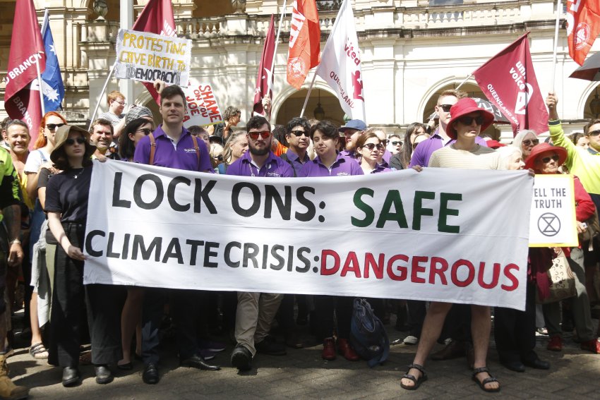 A banner at the Protect the Right to Peaceful Protest rally in Brisbane on October 22.