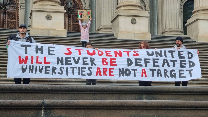 students on the steps of the state library
