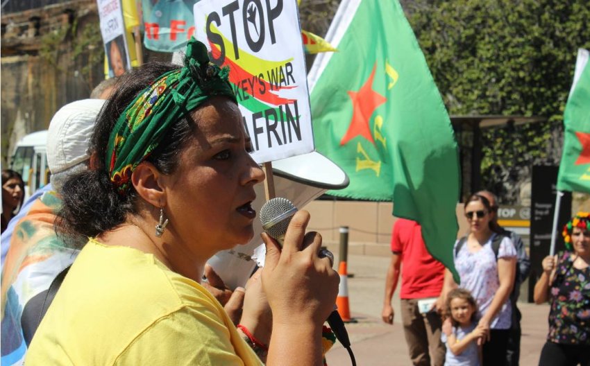 Protester speaking on microphone