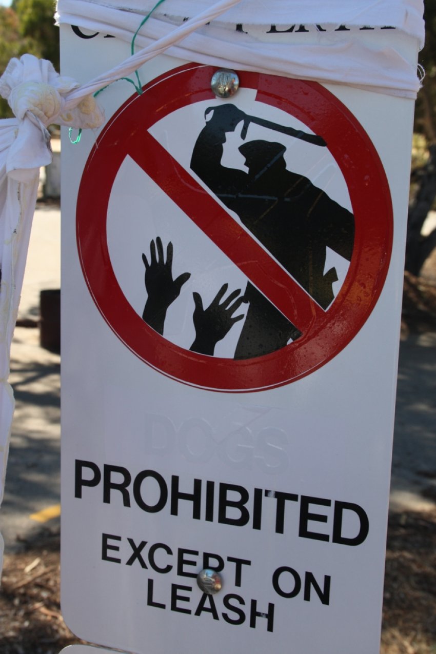 Prohibited except on leash sign