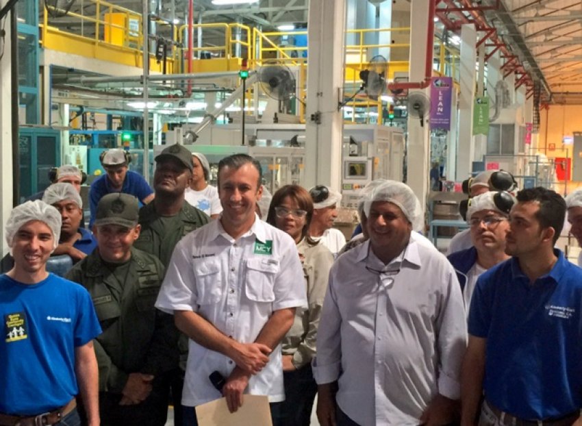 Aragua Governor Tarek El Aissaimi with workers