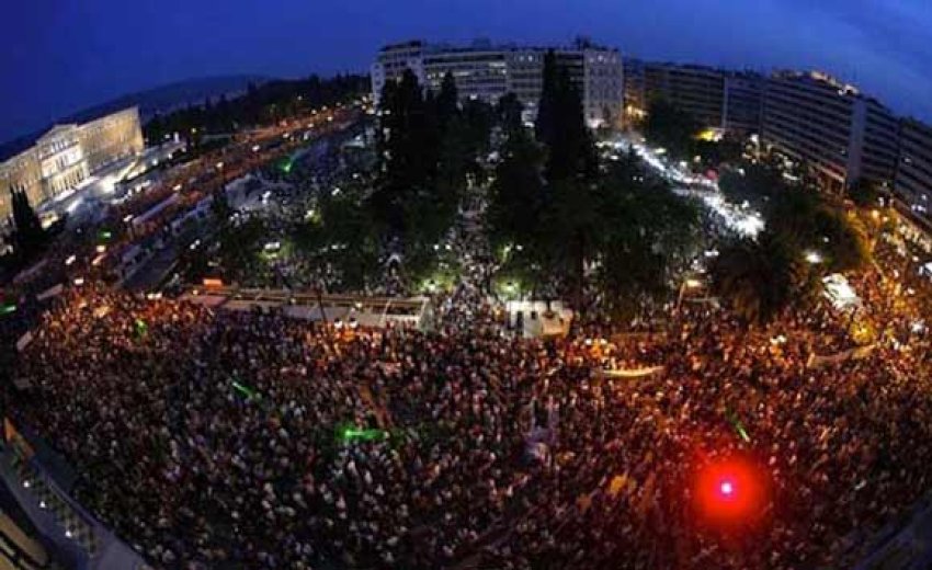 Protesters demonstrating in front of the Greek Parliament