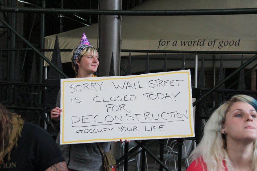 Occupy Wall Street protester with sign