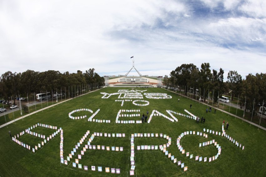 A protest outside parliament house over moves to abandon the Renewable Energy Target.