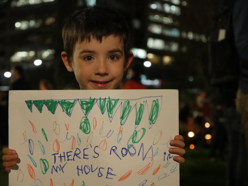 Child with placard