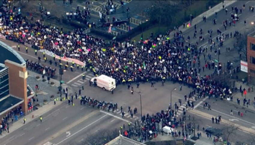 Thousands of people gather at the University of Illinois