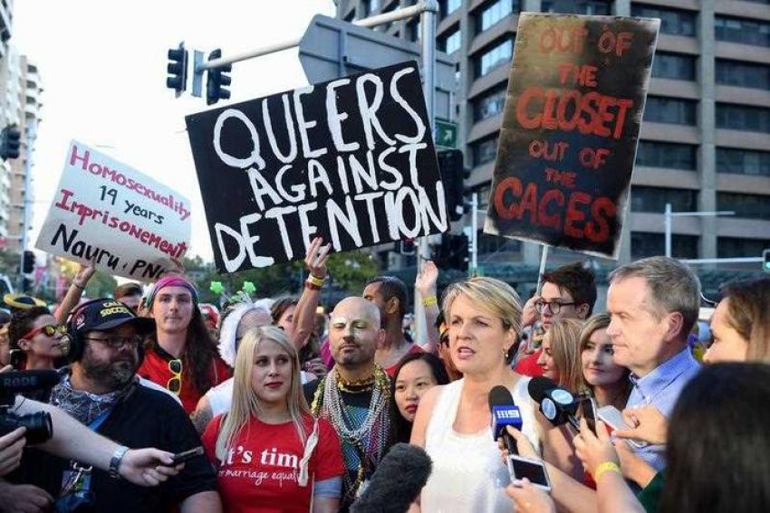 Refugee activists chanting “We're here, we're queer, refugees are welcome here” at Shorten/Plibersek press conference.