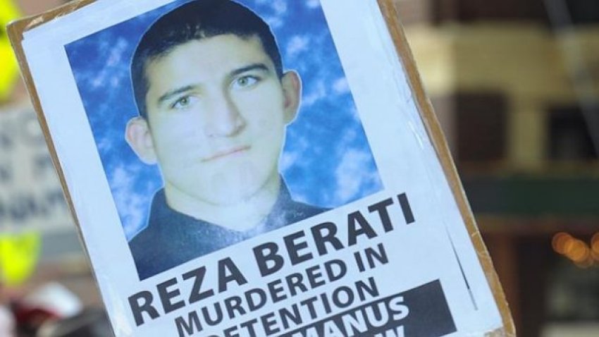 A placard remembering Reza Berati