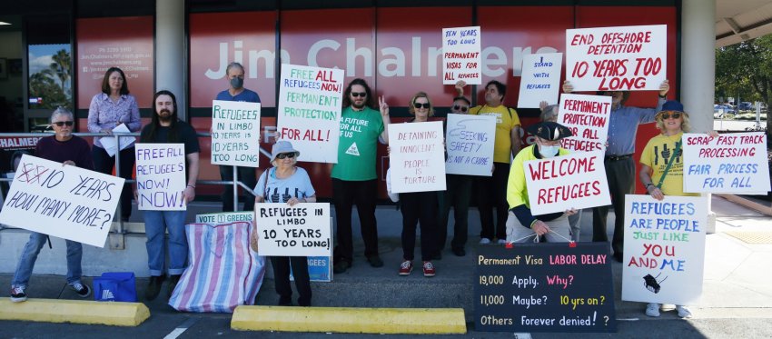 Refugee rights activists outside treasurer Jim Chalmers' office