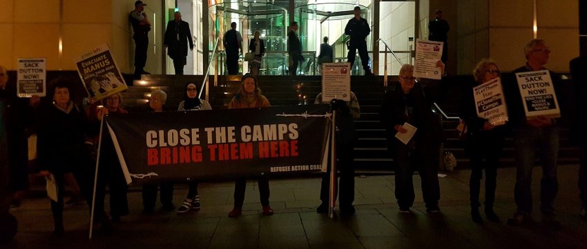 Refugee activists outside the Sydney Insitute.