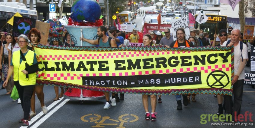 Climate Emergency banner leads the march