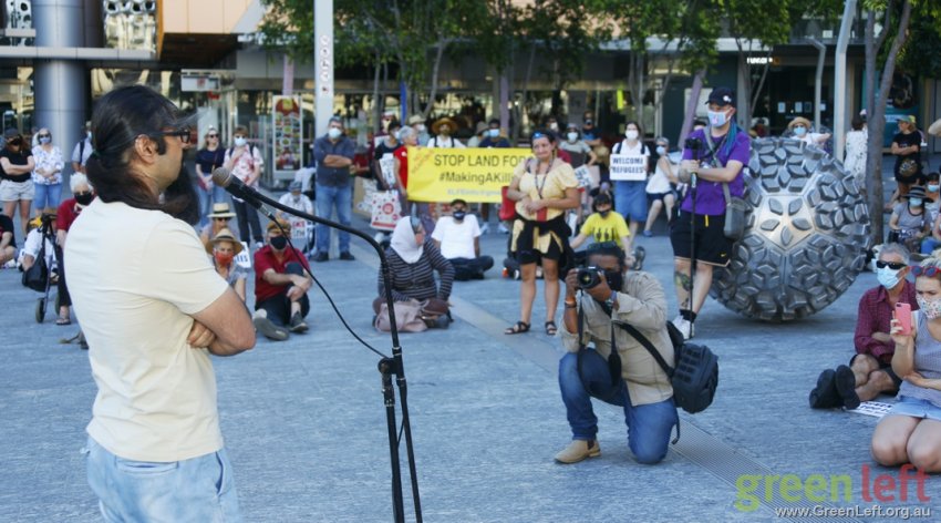 Released refugee Kazem speaks to Brisbane rally. Photo: Alex Bainbridge