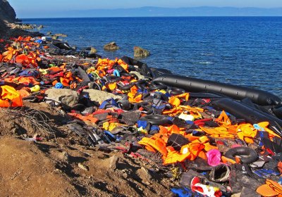 Discarded lifejackets on a Mediterranean coastline. Photo: Pixabay
