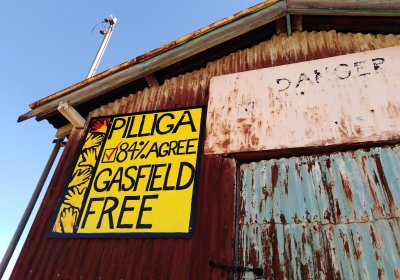 An anti-coal seam gas mural on a building in Pilliga township.