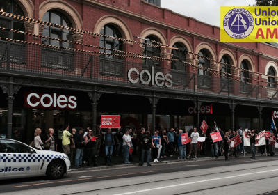 Coles meat workers picketing a new Coles supermarket