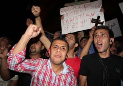 Coptic Christians protest against attacks.