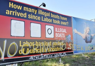 Defaced Liberal campaign billboard