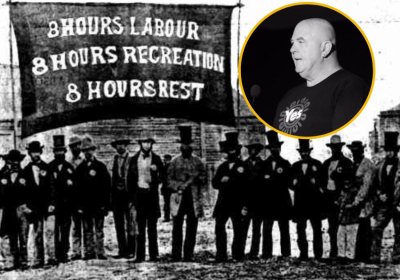 Workers hold banner that reads '8 hours labour, 8 hours recreation, 8 hours rest'