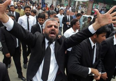 Pakistani lawyers take to the streets to condemn the Quetta bombing.