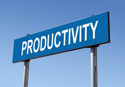 Blue sign against a blue sky that reads 'productivity'.