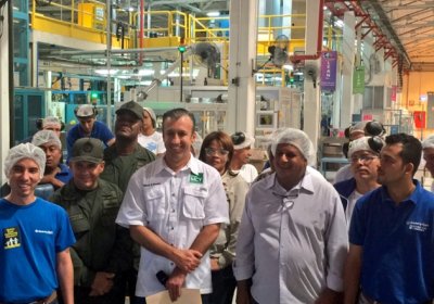 Aragua Governor Tarek El Aissaimi with workers
