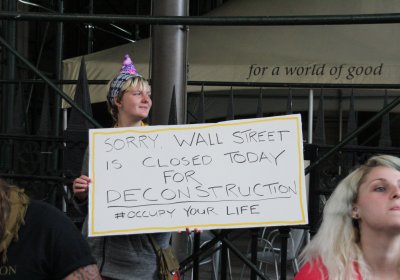 Occupy Wall Street protester with sign