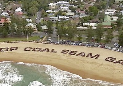 Stop coal seam gas human sign on Austinmer Beach