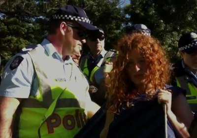 Protester forcibly stripped in public by the Victorian police