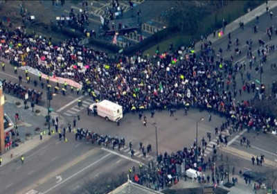Thousands of people gather at the University of Illinois