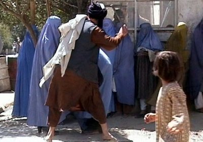 Taliban beating woman in public in 2001 cr RAWA