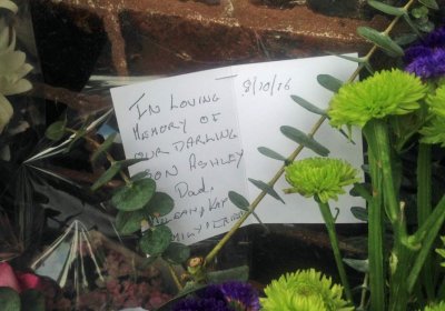 A card left by  the family of Ashley Morris, one of two workers killed at the Eagle Farm Racecourse when a concrete slab fell on them on October 7.
