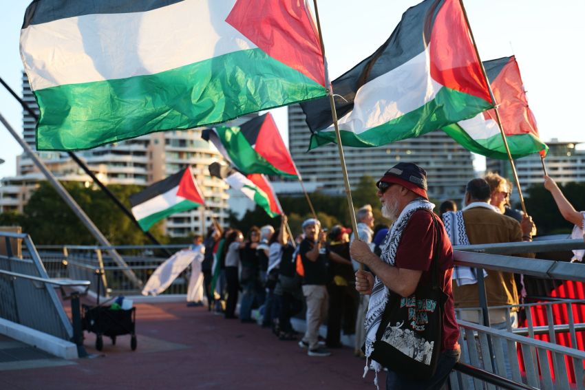 Waving Palestinian flags