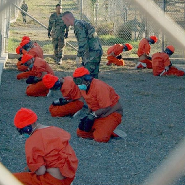 Detainees held in Camp X-Ray at the US Guantanamo Bay facility.